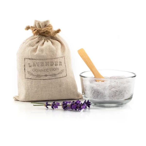 muslin bag with Lavender Connection logo, lavender bath salts in small glass bowl with wooden spoon