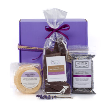 Lavender Shortbread Cookies, Lavender Dark Chocolate Bark, and Lavender Earl Grey Tea in foreground, with purple gift box in background